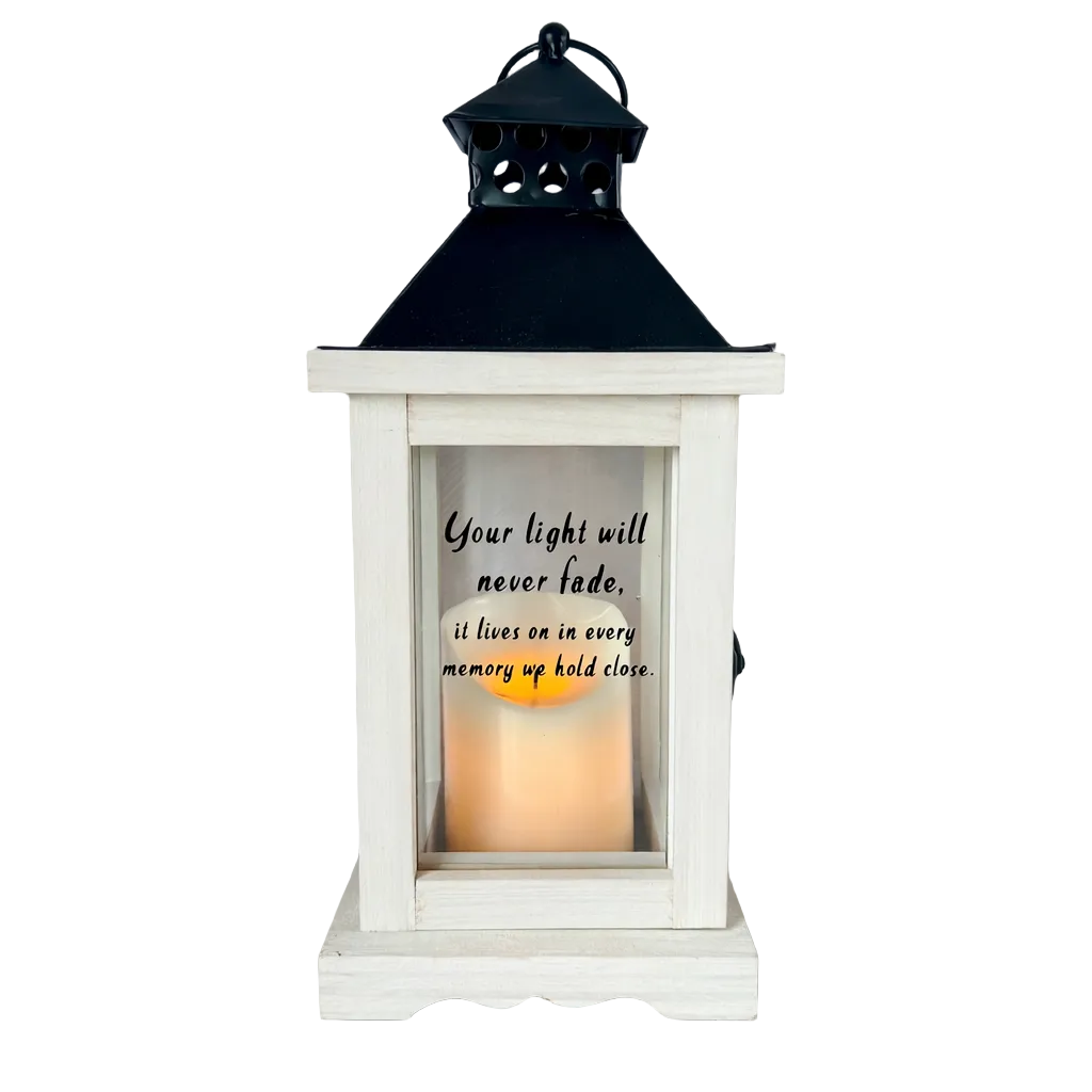 White lantern with a candle inside and a quote on a light gray background