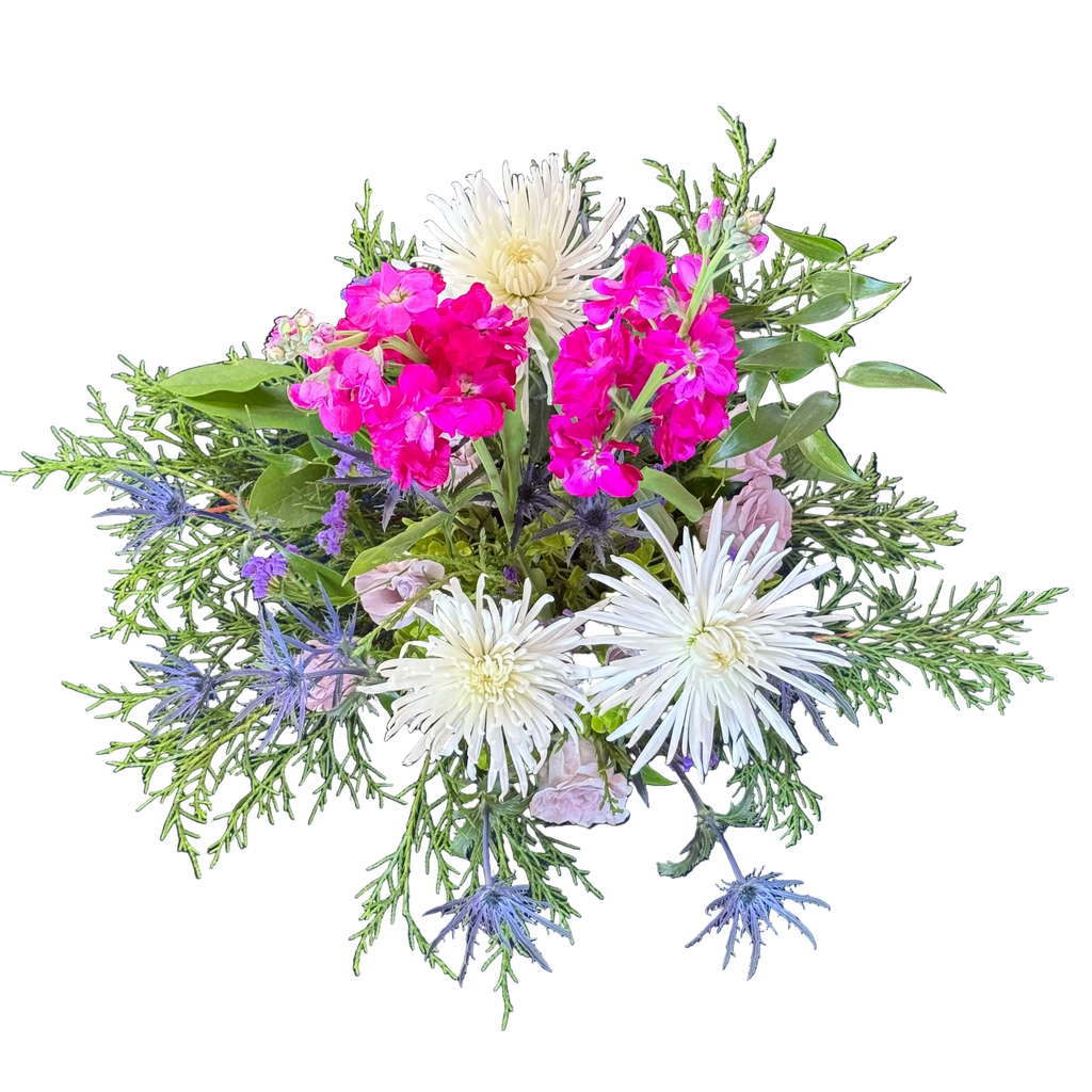 Bouquet of flowers with pink, white, and green on a dark blue background