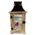 Wooden lantern with a glass panel featuring a cardinal and floral design, on a white background.