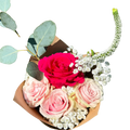 Bouquet of flowers with pink and white roses and a red rose on a white background